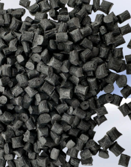 Close-up of PA66 CF30 BLACK carbon-fiber reinforced nylon 66 granules